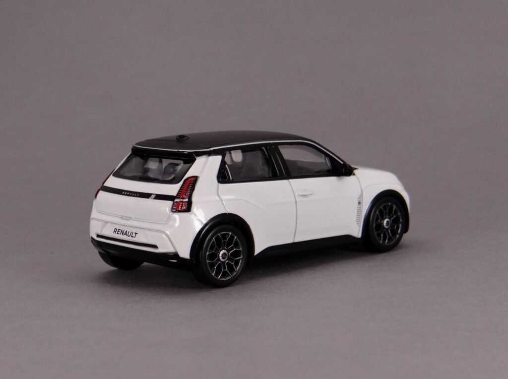 Renault 5 E-Tech Roland Garros three-quarters rear shot. A diecast model in 1/43 scale